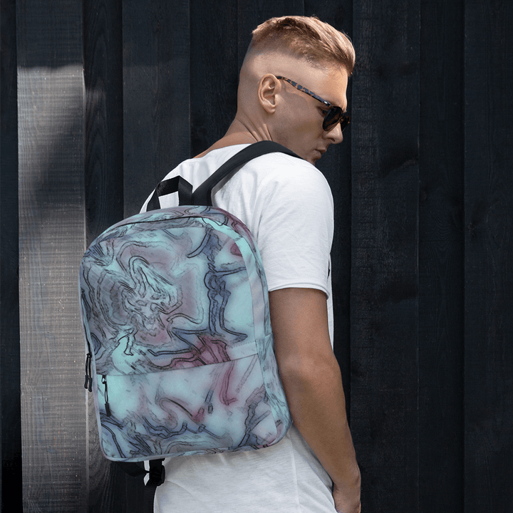 McGood Print All Over Backpack The design is an old one I've always liked. We hope you do too! This medium size backpack is just what you need for daily use or sports activities! The pockets (including one for your laptop) give plenty of room for all your