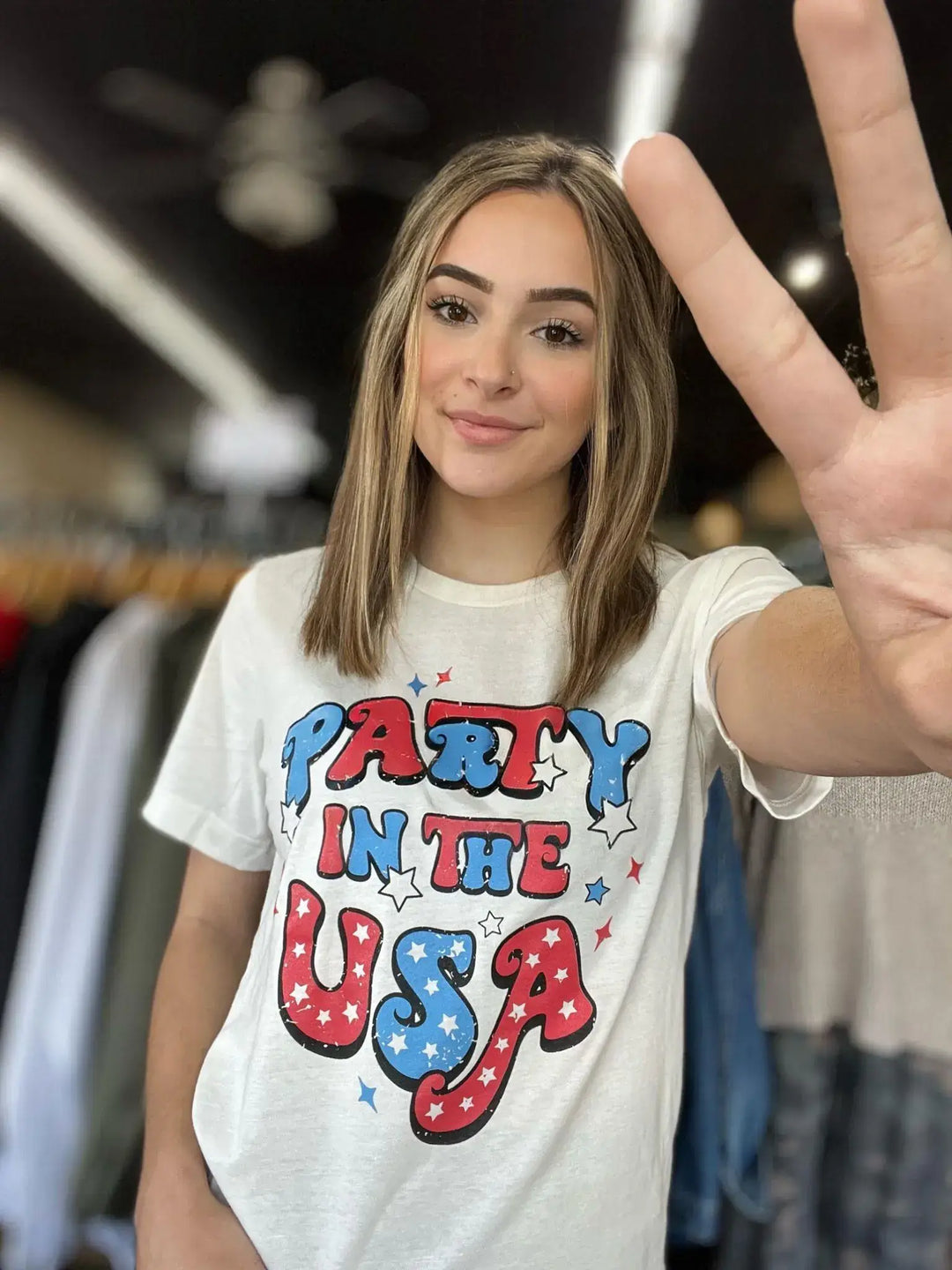 Party in the USA This tee is giving us all the retro vibes!! The graphic is so adorable and perfect for the 4th of July! Model is wearing size Small, her true size $34.99 to $34.99