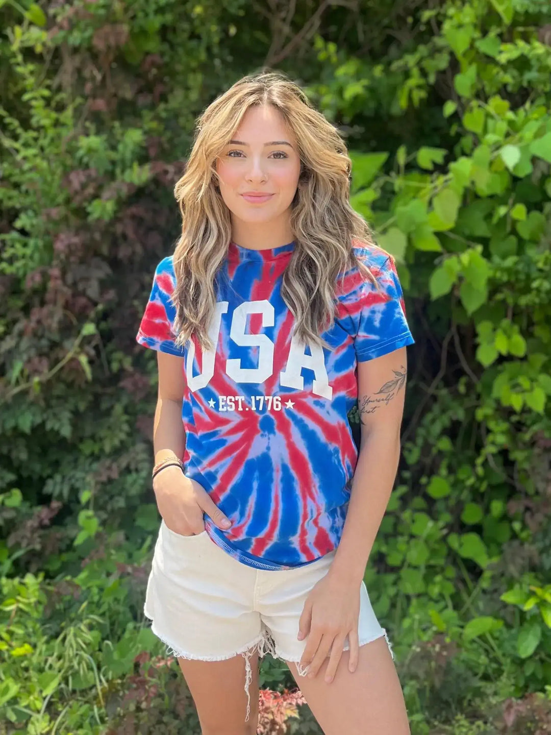 Tie Dye USA Tee Okay, we really did something with this one! Rock the Fourth Of July cookout (or anywhere else really) in this stunning tie dye tee! Model is wearing a size Small, her true size. $35.0 to $35.0